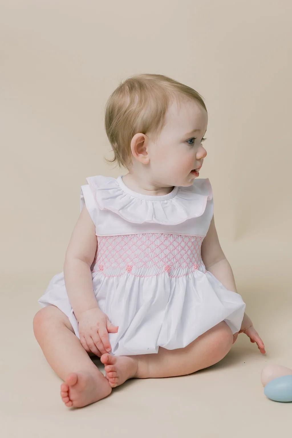 Smocked Toulouse Romper in White with Pink Ruffle Collar